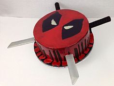 a cake with a knife sticking out of it's side on a white surface