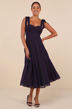 Your bubbly attitude will find a perfect match with the Lulus Sophisticated Charisma Purple Tie-Strap A-Line Midi Dress! Lightweight woven chiffon shapes this darling dress that has tying shoulder straps and a bustier-inspired bodice with seamed cups and a fitted waist. Skirt has a flirty A-line silhouette, finishing at a midi hem. Hidden zipper/clasp at back. Fit: This garment fits true to size. Length: Mid-calf length. Size medium measures 42.5" from adjustable straps to hem. Bust: Great for a Fitted Chiffon Dresses With Tie Straps, Chic Chiffon Dress With Tie Straps, Sweetheart Neckline Midi Dress With Tie Straps For Party, Party Midi Dress With Sweetheart Neckline And Tie Straps, Dresses Medium Length, Purple Midi Dress, Purple Tie, Adhesive Bra, Darling Dress