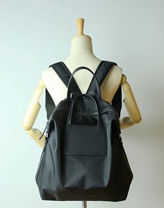 Overview： Design: Womens Black Nylon Backpack Purse Best Satchel Backpack Nylon Leather School Rucksack for LadiesIn Stock: Ready to Ship (2-4 days)Include: Only BagCustom: NoColor: Black, Light Green, Gray, Khaki, Green, Light GrayLeather: Nylon, LeatherMeasures: 38cm x 34cm x 13cmWeight: 0.6kgSlots: 1 main slot, 1 zip slot, 1 phone pocket, 1 wallet pocket, 1 laptop slotAccessories(option): NoneStyle: Womens Black Nylon Backpack Purse Best Satchel Backpack Nylon Leather School Rucksack for Ladi School Rucksack, Handmade Backpacks, Biker Wallet, Satchel Backpack, Short Wallet, Backpack Bag, Fabric Bags, Black Nylon, Men's Backpack