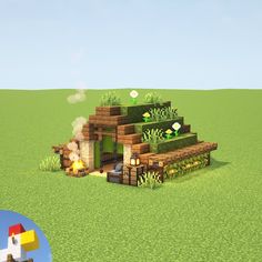 an image of a small house made out of blocks in the middle of a field