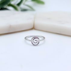 .925 Sterling Silver Delicate Spiral Ring This cute spiral ring is super delicate with a 1mm band, made out of solid 925 sterling silver and features an infinite spiral/swirl representative of the 'infinite' in all that is. Great as a stacking ring with others or simple on its own. Top of ring width: 8mm Band width: 1mm Ring Size: 5,6,7,8,9,10 For a much thicker/chunkier version of this ring see here: https://www.etsy.com/au/listing/604553284/sterling-silver-spiral-ring-cute-silver 💎 LISTING IS Minimalist Spiral Rings For Everyday, Minimalist Spiral Stackable Rings, Minimalist Everyday Spiral Rings, Silver Spiral Midi Rings As Gift, Modern Twist Spiral Stackable Rings As Gift, Adjustable Spiral Midi Rings In Minimalist Style, Minimalist Spiral Promise Ring, Spiral Sterling Silver Promise Ring, Spiral Stackable Sterling Silver Rings For Gift