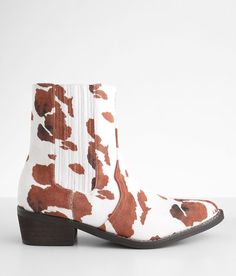 ARider Girl Cow Print Ankle Boot - Brown/White US 6-1/2, Women's Brownwhitecow Faux suede printed bootie Side zip detail Metal toe cap Cushioned footbed 6 1/2 shaft 1 3/4 heel. All man made materials.. WOMEN'S SHOE SIZE CONVERSION CHART US 5 5.5 6 6.5 7 7.5 8 8.5 9 9.5 10 11 12 EU 35-36 36 36-37 37 37-38 38 38-39 39 39-40 40 40-41 41-42 42-43 UK 3 3.5 4 4.5 5 5.5 6 6.5 7 7.5 8 9 10 *Conversion sizes may vary. Available in whole and half sizes. Apparel & Accessories > Shoes Cow Boots, Buckle Booties, Buckle Ankle Boots, White Cow, Chelsea Ankle Boots, Wedge Ankle Boots, Buckle Shoes, Buckle Boots, Brown Ankle Boots