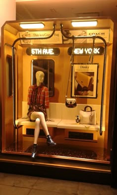 a mannequin sitting on a bench in front of a mirror