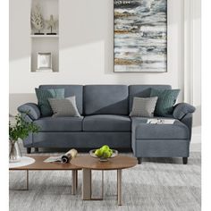 a living room scene with focus on the couch and coffee table