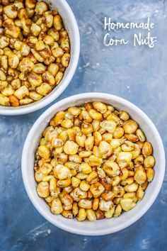 two white bowls filled with corn on top of a blue tablecloth and the words homemade corn nuts