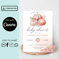 a baby shower with pumpkins and flowers on it