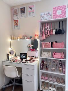 a white desk topped with lots of drawers and shelves filled with purses on top of it