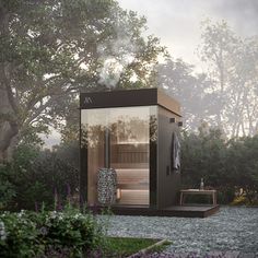 an outdoor sauna is shown in the middle of a garden