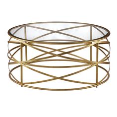 a gold metal and glass coffee table