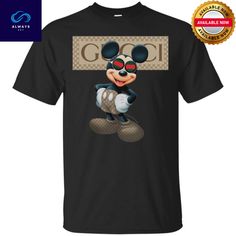 Disney mickey white T Shirt - Moano Store Mickey x Alwaysky. A shirt is a multipurpose garment that is available in a variety of cuts and patterns. Generally composed of diverse materials like cotton, silk, or polyester, shirts are an essential piece of apparel for individuals of both sexes. They come in a variety of styles and lengths, are formal or informal, and frequently serve as a blank canvas for the adornment of slogans, patterns, and artwork. Shirts are a classic and necessary component Black Short Sleeve Mickey Mouse Shirt, Black Mickey Mouse Short Sleeve Shirt, Trendy Mickey Mouse Short Sleeve T-shirt, Mickey Halloween, Mickey Shirt, Disney Diy, White T Shirt, Store Design, Xmas Gifts