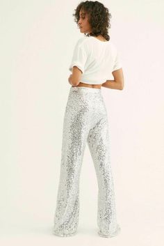 Free People Festival Sequin Pants-L-$248 MSRP Available for purchase new w/o price tag is a Factory Outlet (see description below for history; has black line going thru cloth label name) Free People Pants -  Festival Sequin Pants -  Size Large; measures approx. 36" waist, 46" hips, 50" length, 35" inseam, 13" rise -  The sparkle and flare your closet has always needed, these sequin embellished pants are featured in the perfect high-waisted silhouette. Elastic waistband at top hidden side zip clo Cloth Label, Label Name, Sequin Pant, Free People Velvet, Sequin Pants, Free People Store, Black Line, Velvet Pants, Floral Pants