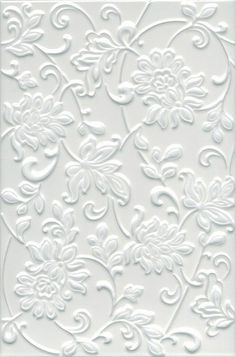 white embossing paper with flowers and swirls