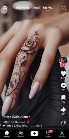 a woman's hand with tattoos on it and the text tattoo exponer above her