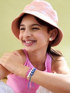 Brighten up your little one’s wrist stack with the Bubblegum Baby Kids’ Bracelet Set. This pack includes three adorable pull tie bracelets in pink, blue and white. Each one is decorated with cute white gemstones so even your mini can rock some sparkle. Please note: intended for children 3+. Adjustable Playful Friendship Bracelets, Adjustable Playful Charm Bracelet, Casual Adjustable Beaded Bracelets For Birthday, Playful Adjustable Blue Friendship Bracelets, Adjustable Pink Charm Bracelet For Everyday, Adjustable Cute Friendship Bracelets With Letter Beads, Everyday Adjustable Pink Charm Bracelet, Playful Adjustable Blue Jewelry, Adjustable Playful Blue Jewelry