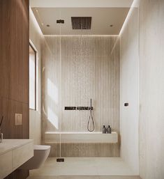 a bathroom with a tub, sink and shower head in it's center wall