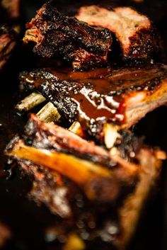 barbecue ribs with bbq sauce and vegetables on the side