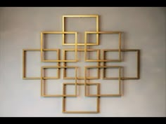 a wall sculpture made out of wooden squares