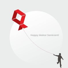 a person flying a kite with the words happy makar sank written on it in red