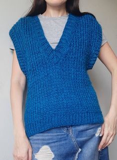 Knitted women v neck vest /knit wool turquoise vest.  This vest was knitted from wool yarn.  It is very soft, warm.   The color is very unusual turquoise with melange. It is very soft and 100% original. Materials that I use high quality.  It is suitable with different kinds of clothes.   So I'm sure you'll love it One Size fit s,m, l Care of the product Only hand wash. Wash a water temperature of 30oC. Lay on a flat surface to dry, do not tumble dry. Vest Knit, Grey Knit Cardigan, Oversized Vest, Vest Women, Knitted Vest, Wool Vest, Kinds Of Clothes, Vest Outfits, Knit Vest