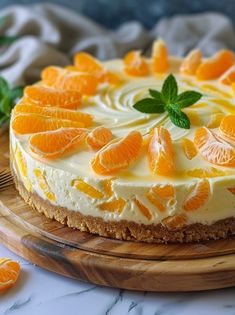 an orange cheesecake on a wooden platter