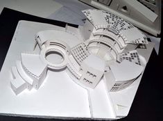 an architectural model is displayed on a table