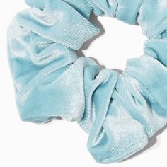 This pretty baby blue hair scrunchie with a soft, velvety finish is a must-have addition to your hair accessory collection! It's perfect for accenting your ponytail or bun, or just wrapping around your wrist as a fun two-for-one fashion accessory.Elastic stretchMaterial: Polyester - Claire's Baby Blue Velvet Hair Scrunchie Blue Velvet Hair, Baby Blue Hair, Blue Scrunchie, Hair Accessories Collection, Velvet Hair, Fashionable Jewelry, Blue Velvet, Hair Accessory, Birthday Presents