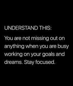 a black and white photo with the words, understand this you are not missing out on anything when you are busy working on your goals and dreams stay focused