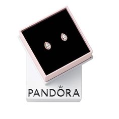 PRICES MAY VARY. Elegant Earrings: The elegant 14k rose gold-plated earrings have been set with teardrop-shaped cubic zirconia surrounded by smaller stones that sparkle as they catch the light Pandora Timeless Collection: A timeless, elegant, and versatile collection with sparkling stones as their centerpiece, for those you cherish and those that cherish you Features CZ: Cubic zirconia could be said to be the jewel in Pandora's crown, making up the majority of stones we use in our jewelry becaus Crown Making, Pandora Collection, Pandora Earrings, Halo Stud Earrings, Halo Earrings Studs, Timeless Jewelry, Gold Plated Earrings, Pandora Jewelry, Elegant Earrings