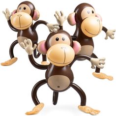 three monkey figurines in the shape of two dancing monkeys