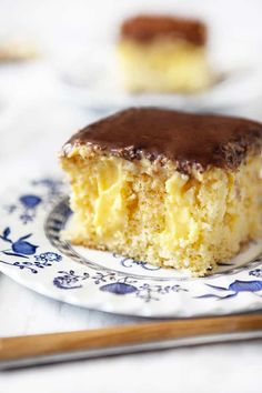 a piece of cake sitting on top of a blue and white plate