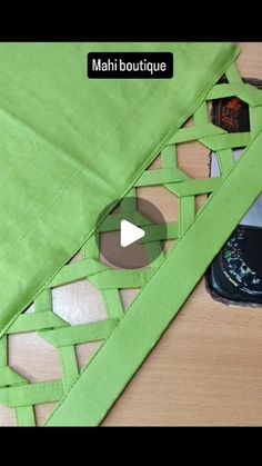 the video is showing how to make a piece of fabric