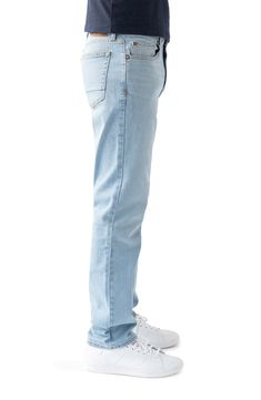 Slim but not tight, these light-wash straight-leg jeans are made with performance-stretch denim to give you all-day flexibility, comfort and shape retention. 15" leg opening; 10 1/2" front rise 98% cotton, 2% spandex Machine wash, tumble dry Imported Light Wash Stretch Straight Jeans, Stretch Straight Jeans In Light Wash, Straight Stretch Jeans In Light Wash, Non-stretch Straight Leg Solid Color Jeans, Cheap Men's Straight Jeans, Pre-washed Straight Leg Denim Blue Jeans, Straight Leg Pre-washed Jeans In Washed Blue, Straight Fit Full-length Rigid Denim Jeans, Devil Dogs