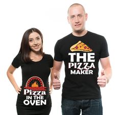 two people wearing t - shirts that say the pizza maker in the oven and the one on the right has a slice of pizza