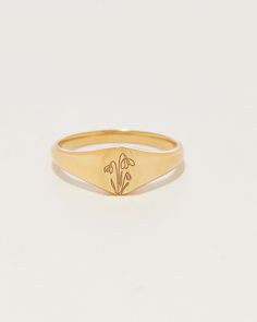 PETITE ∙ SIGNET ∙ R I N G D E T A I L S A classic oval ring with your favorite birth flower. * Material: Sterling Silver, 14K Gold Filled , 14K Rose Gold Filled or 14K solid gold (Gold Filled is made of thick 14k gold or rose gold layered on .925 sterling silver.) * Oval size: 5x7mm * Band width: 2.5mm Personalized with our Code Blue Jewelry original floral illustrations Oval Flower Ring Stamped 14k For Gift, Classic Adjustable Flower Ring For Anniversary, Classic Yellow Gold Flower Ring For Gift, Classic Yellow Gold Flower Ring As Gift, Classic Oval Flower Ring, Classic Oval Flower Promise Ring, Classic Rose Gold Flower Ring As Gift, Classic Adjustable Flower Ring, Bar Bracelet Personalized