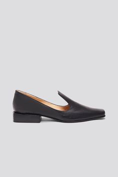 The Olympia Loafer is a babouche-inspired loafer featuring a square boxy toe, a cut-away upper, and a stacked leather heel. Olympia sets itself apart from the typical loafer thanks to its elegant lines. Style the Olympia loafer with suiting for a modern work look or with slip dresses for an elevated, relaxed evening look. Who it's for: The woman who loves loafers and is looking for a fresh new shape to experiment with. Kidskin leather upper with vegetable tanned leather lining, a stacked leather heel and leather sole Handmade in Argentina 2024 Wardrobe, Womens Loafers, Buckled Flats, Slip Dresses, Work Looks, Charlotte Olympia, Style Expert, Vegetable Tanned Leather, Beautiful Shoes