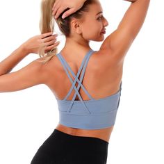 The EMES SHOP sports bra is detailed with a scoop neckline. Features double racerback straps that crossover the open back. This lightweight. breathable. quick-drying sports bra is perfect for your next gym session or yoga class.MATERIAL:85% Nylon 15% SpandexMEASUREMENTS:Small : 4-6 Waist: 25-26.5 in Chest: 33-34.5 in Medium : 6-8 Waist: 26.5-28 in Chest: 34.5-36 in Large : 8-10 Waist: 28-29.5 in Chest: 36-37.5 in X-Large : 10-12 Waist: 29.5-31 in Chest: 37.5-39 in