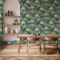 a dining room with green wallpaper and wooden table