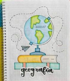 an open notebook with the words geographia written on it and a drawing of a globe