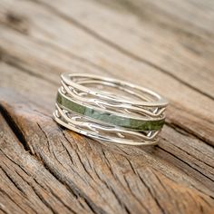 a stack of rings sitting on top of a wooden table