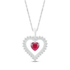 This beautiful heart necklace is a sparkling look that's easy to love. Crafted in sterling silver A heart-shaped lab-created ruby suspends fixed inside a heart-shaped frame Shimmering round-cut white lab-created sapphires surround the silhouette The pendant suspends along an 18-inch rope chain that secures with a spring ring clasp Valentine's Day Birthstone Heart Necklace In Fine Jewelry, Valentine's Day Fine Jewelry Heart Necklace With Birthstone, Heart Cut Birthstone Necklace For Valentine's Day, Valentine's Day Heart Cut Charm Necklace, Valentine's Day Heart Cut Birthstone Necklace, Valentine's Day Diamond Heart Necklace With Birthstone, Valentine's Day Diamond Heart Birthstone Necklace, Red Necklaces With Diamond Accents For Valentine's Day, Heart-shaped Lab-created Ruby Birthstone Jewelry