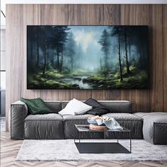 a living room filled with furniture and a large painting on the wall above it's couch