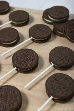 chocolate oreo pops are lined up on a table