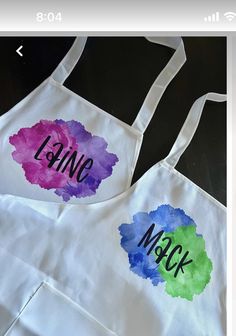 two aprons with the words lanc and mack painted on them