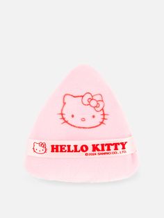 Apply makeup like a pro, thanks to this Hello Kitty triangle powder puff. Rendered in a baby pink hue and topped with Kitty White imagery and a branded ribbon to help you hold it with ease, this beauty sponge is ideal for pressing and patting in powder makeup. Branded Ribbon, Seamless Socks, Girls Nightwear, Cute Sanrio, Kids Flip Flops, Sanrio Stuff, Baby Swimwear, Leggings Hoodie