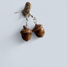 Cute handmade acorn earrings. Would make a cute gift for that special nut in your life! Clay Acorn Earrings, Earthy Materials, Resin Acorn Pendants, Silver Acorn Earrings, Acorn Earrings, Acorn Jewelry, Acorn Pendant, Hanging Earrings, Cute Gift