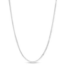 From the Made in Italy collection, this men's 0.8mm box chain necklace is crafted in 14K white gold. The necklace features a slide mechanism which allows it to adjust up to 22.0 inches in length and secures with a lobster claw clasp. White Gold Tennis Necklace With Box Chain As Gift, Classic Silver Tennis Necklace With Box Chain, Formal Silver Tennis Necklace With Box Chain, Silver Tennis Necklace With Box Chain For Formal Occasions, Silver Box Chain Tennis Necklace For Formal Occasions, Silver Box Chain Tennis Necklace For Formal Events, Silver Tennis Necklace Gift, Classic Formal Tennis Necklace With Box Chain, Classic White Gold Tennis Necklace With Box Chain