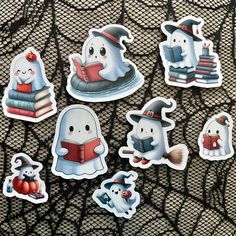 halloween stickers with ghost reading books and pumpkins