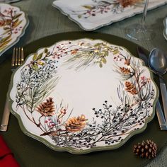 a place setting with plates and silverware