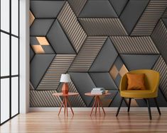 a modern living room with geometric wallpaper