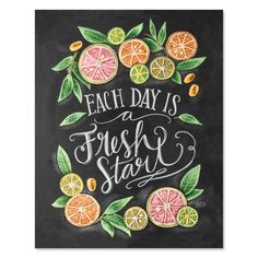 a chalkboard with some fruit on it and the words each day is fresh start